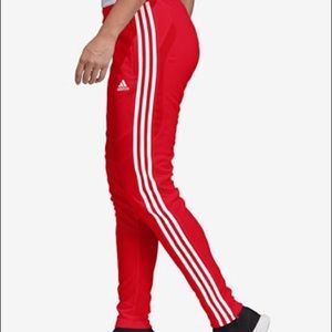 red adidas track pants
